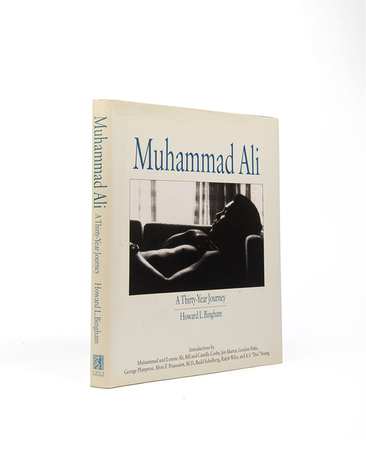 An exceptional copy, inscribed by the author Howard L. Bingham and Muhammad Ali on the title page to American journalist Katie Couric, and signed a further nine times by Ali. 