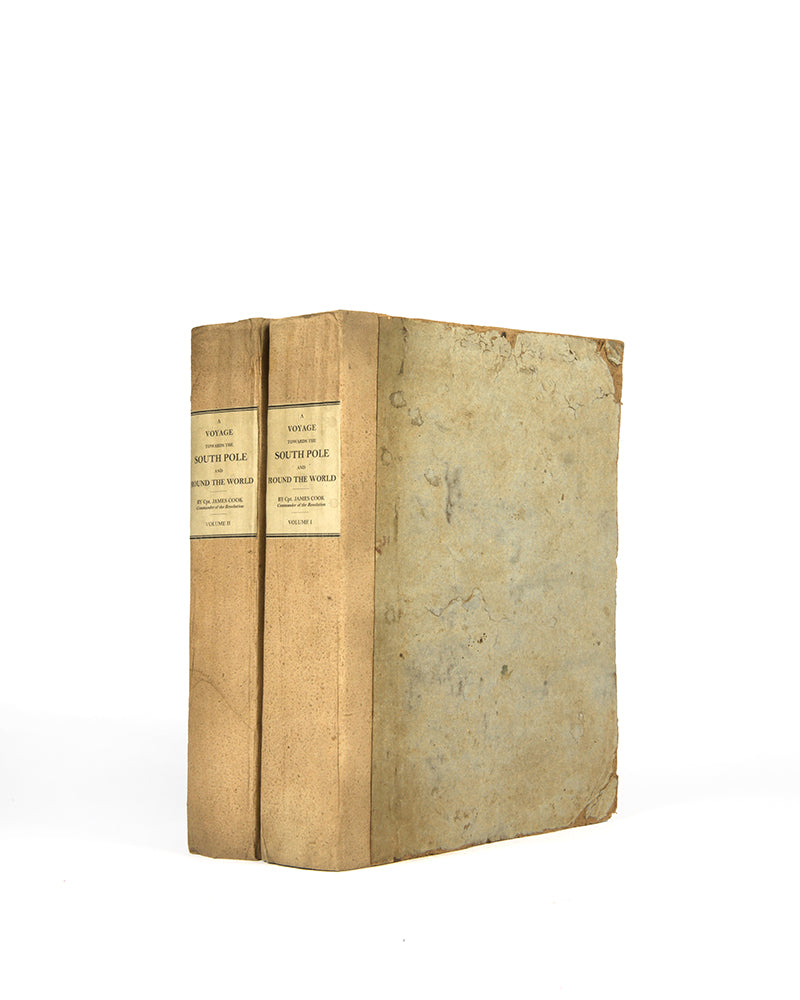 First edition of Cook's A Voyage towards the South Pole, the first to cross the Antarctic Circle, in the rare original boards and the maps and plates uncut.