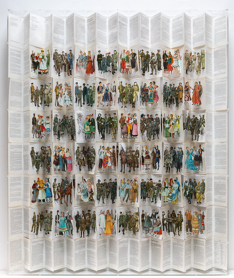 Cut book construction in an acrylic case by Jack Milroy titled Humans