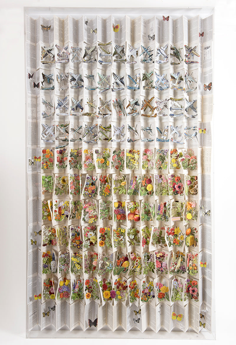 Cut book construction in an acrylic case by Jack Milroy, titled Grey Skies. 