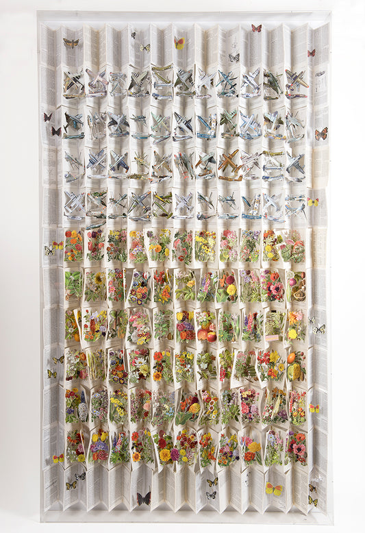 Cut book construction in an acrylic case by Jack Milroy, titled Grey Skies. 