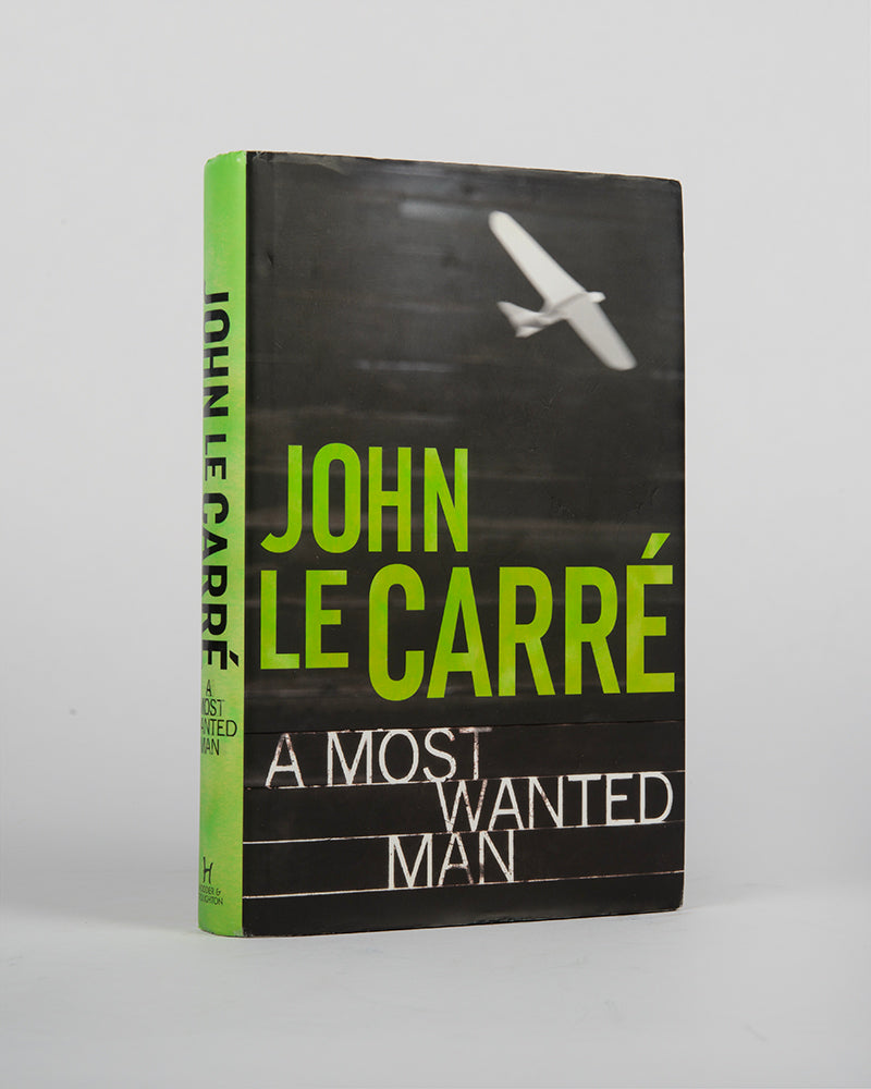In, A Most Wanted Man by John Le Carre, a half-starved young Russian man in a long black overcoat is smuggled into Hamburg at dead of night, he has an improbable amount of cash secreted in a purse