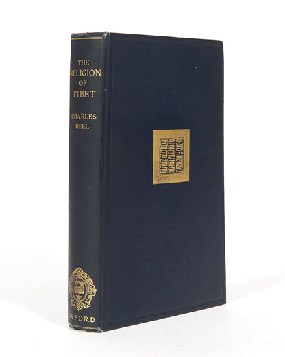A first edition of The Religion of Tibet by Sir Charles Bell.