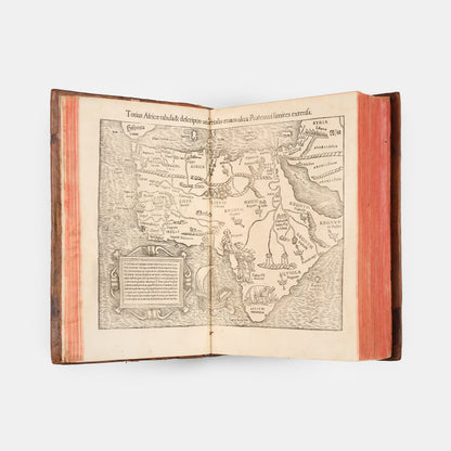 First Latin edition of Sebastian Munster's Cosmographiae Universalis, for the first time with 39 town views, and new world maps and map of America.
