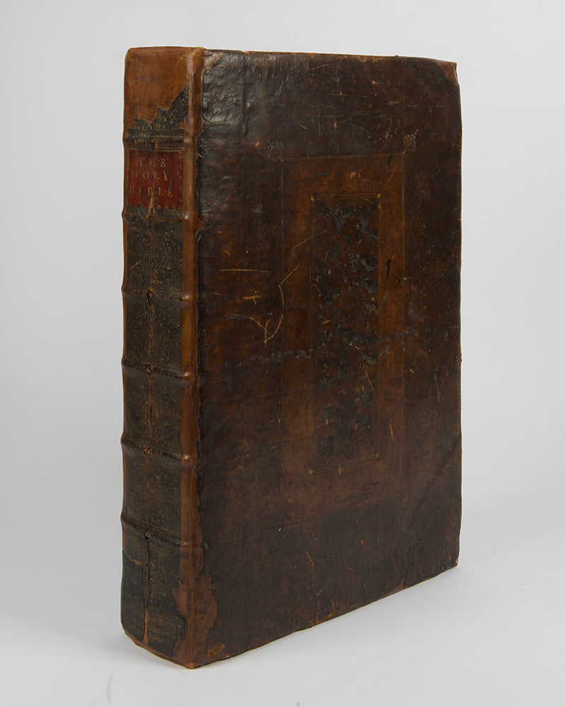 An impressive pulpit folio edition of the King James Bible, illustrated with engraved general and New Testament title-pages, and bound in contemporary panelled calf