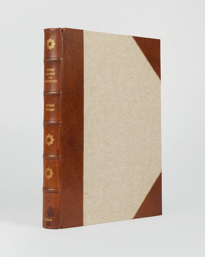 Signed limited edition of Wilfrid Thesiger's Desert, Marsh and Mountain, recounting the Gulf, Iraq and Yemen, just 1 of 160 copies.