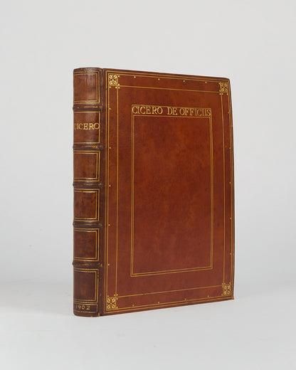 A fine-pritned example of Cicero's De Officiis in English translation, pleasinlgy bound in crushed red-brown morocco gilt