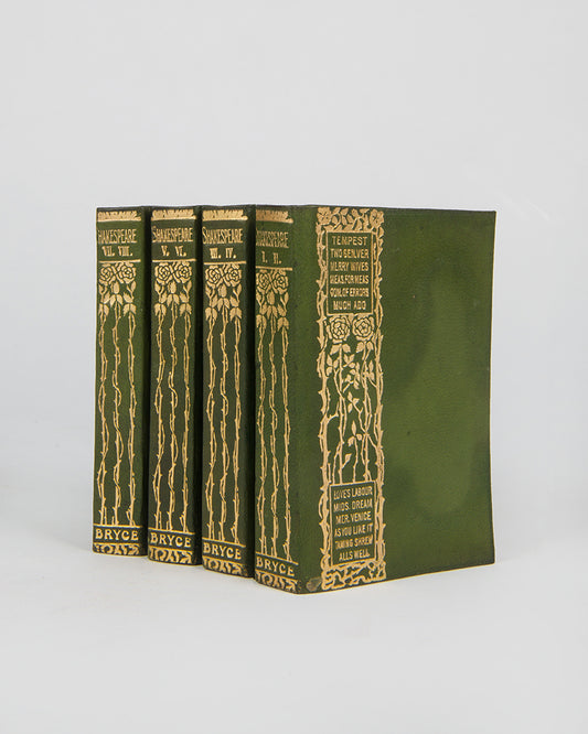 A wonderfully unique set of the works of Shakespeare in four pocket-sized books bound in a beautiful green with floral gilt decoration.
