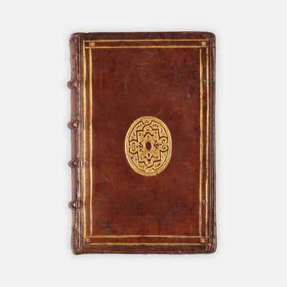 An early edition in English of Sir Anthony Fitzherbert's practical manual The Newe Boke of Justices of Peace, in a contemporary English gilt tooled binding