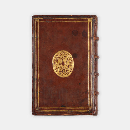 An early edition in English of Sir Anthony Fitzherbert's practical manual The Newe Boke of Justices of Peace, in a contemporary English gilt tooled binding