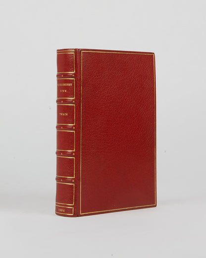 This copy is a first edition of one of the pillars of American literature, The Adventures of Huckleberry Finn by Mark Twain,which follows the titular character's journey down the Mississippi 
