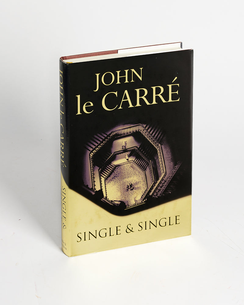 A signed first edition of Single & Single by John Le Carre, a corporate lawyer from the House of Single & Single is shot dead on a Turkish hillside, a financier disappears