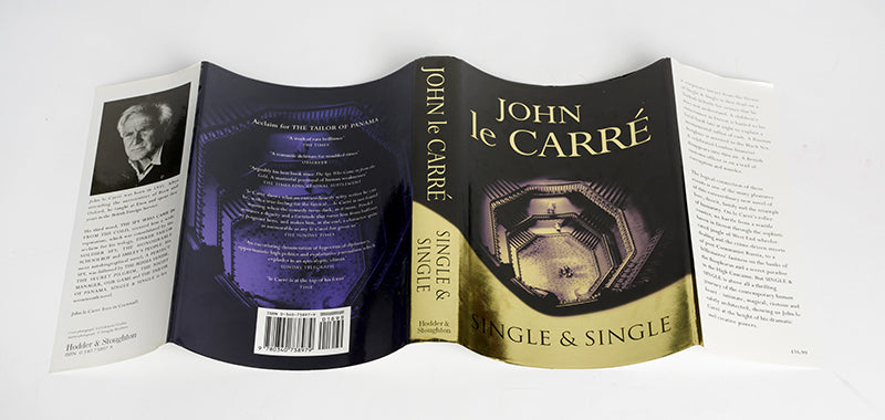 A signed first edition of Single & Single by John Le Carre, a corporate lawyer from the House of Single & Single is shot dead on a Turkish hillside, a financier disappears