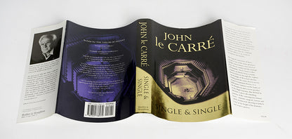 A signed first edition of Single & Single by John Le Carre, a corporate lawyer from the House of Single & Single is shot dead on a Turkish hillside, a financier disappears