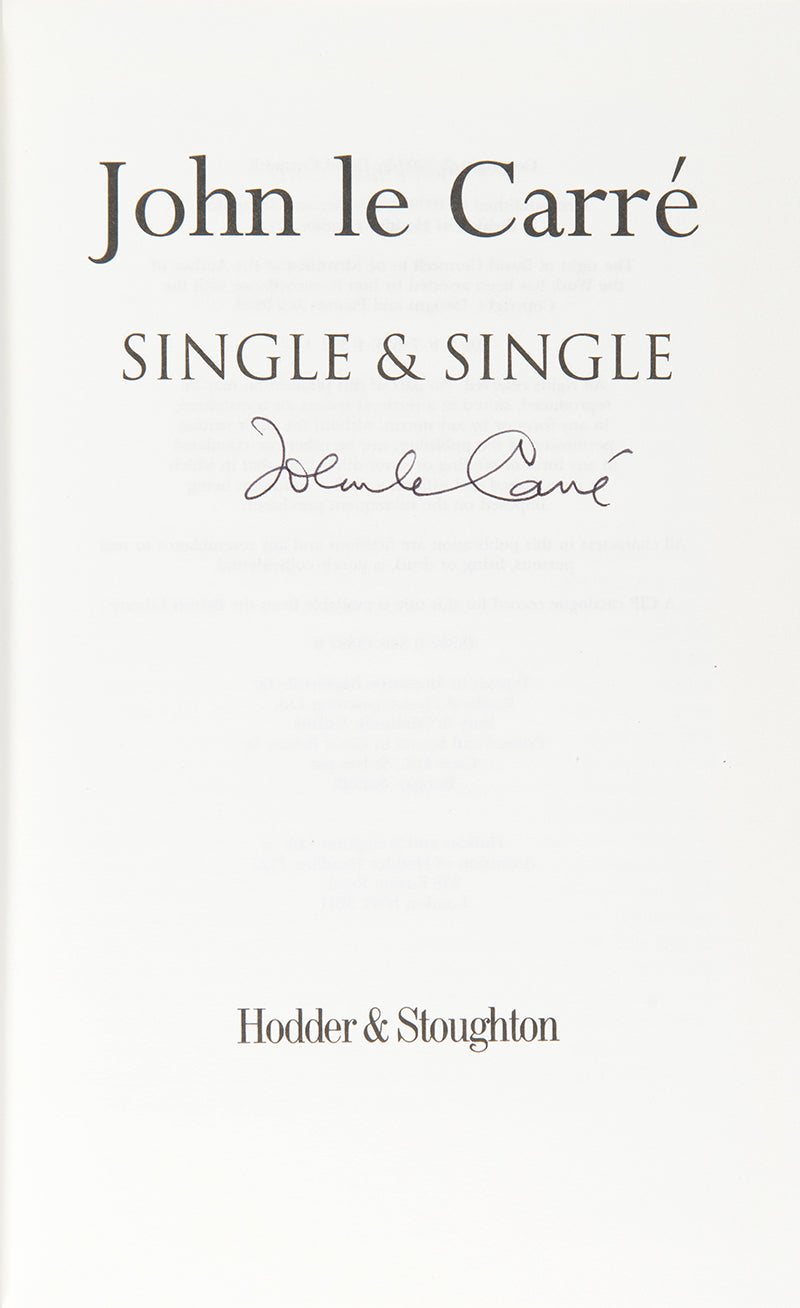 A signed first edition of Single & Single by John Le Carre, a corporate lawyer from the House of Single & Single is shot dead on a Turkish hillside, a financier disappears