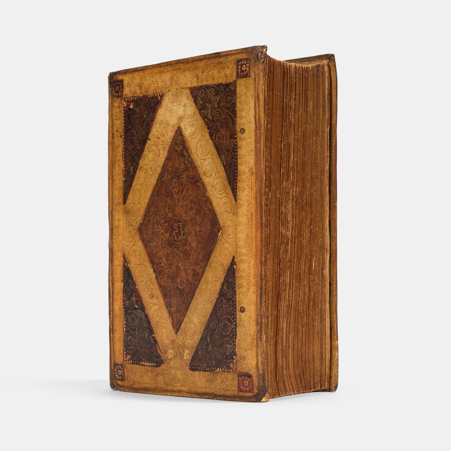 A remarkable copy of the second quarto edition of the Geneva Bible, complete with hand-coloured woodcut illustrations and 5 maps, and bound in seventeenth-century vellum gilt onlaid in red morocco