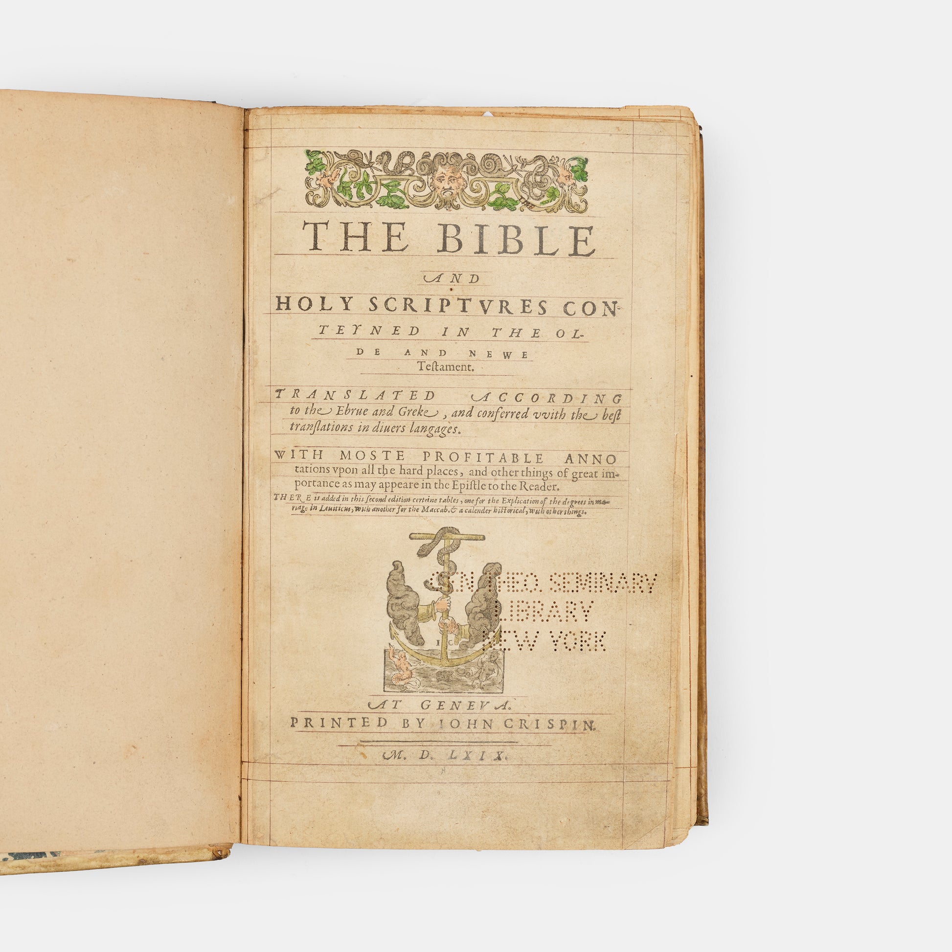 A remarkable copy of the second quarto edition of the Geneva Bible, complete with hand-coloured woodcut illustrations and 5 maps, and bound in seventeenth-century vellum gilt onlaid in red morocco