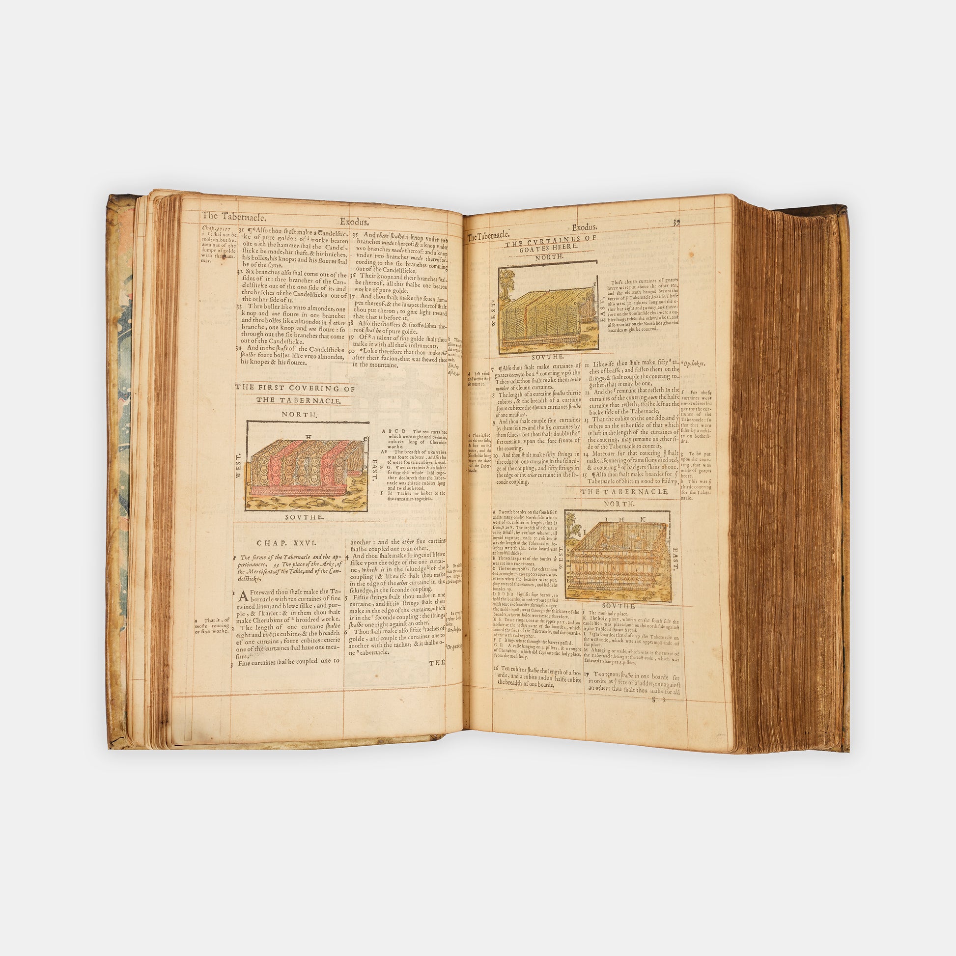 A remarkable copy of the second quarto edition of the Geneva Bible, complete with hand-coloured woodcut illustrations and 5 maps, and bound in seventeenth-century vellum gilt onlaid in red morocco