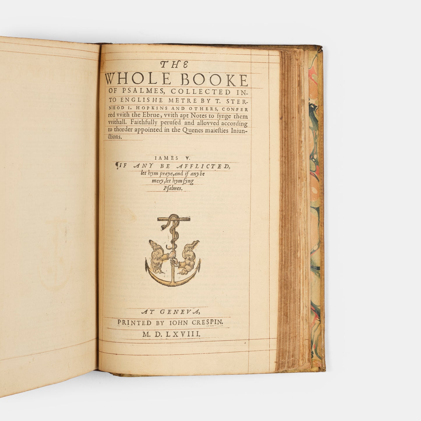 A remarkable copy of the second quarto edition of the Geneva Bible, complete with hand-coloured woodcut illustrations and 5 maps, and bound in seventeenth-century vellum gilt onlaid in red morocco