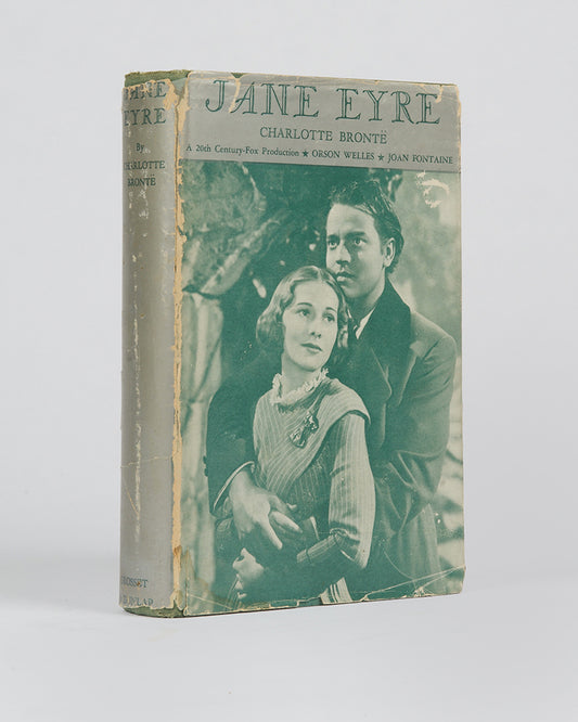 A rare photoplay edition of Jane Eyre published to coincide with the 20th Century Fox film starring Orson Welles and Joan Fontaine, with the two leads appearing on the dust jacket.