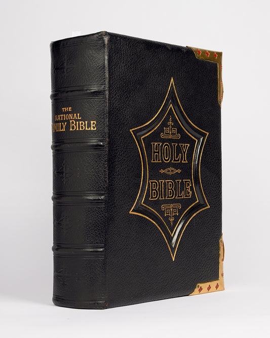 A very-well preserved example of The National Comprehensive Family Bible, illustrated with numerous colour and black and white plates, in the original black morocco binding with fielded relief