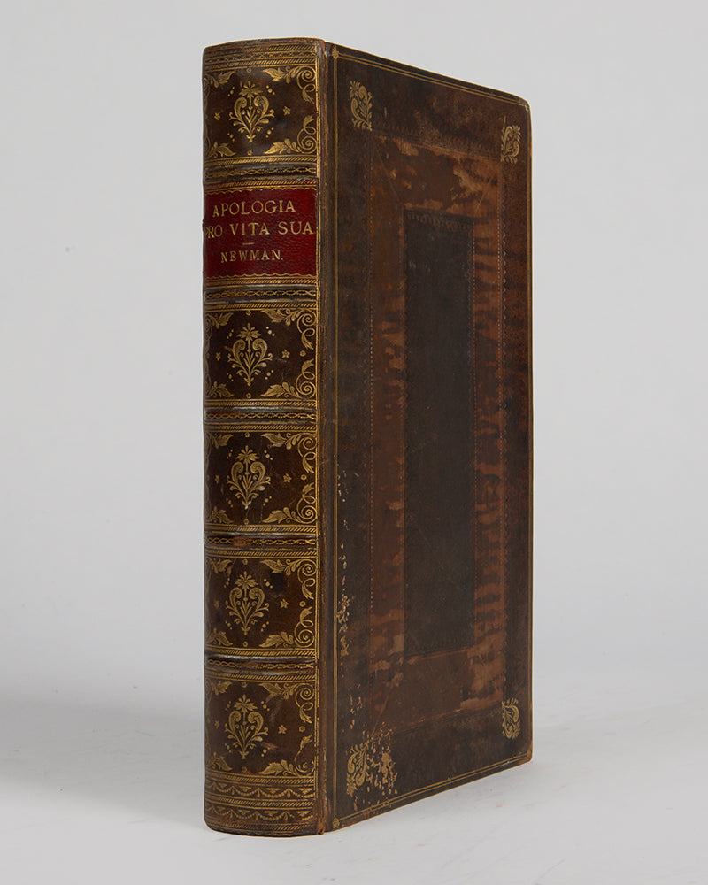 The first edition of John Henry Newman's great spiritual autobiography, the Apologia pro Vita Sua, with the original wrappers bound-in to the rear