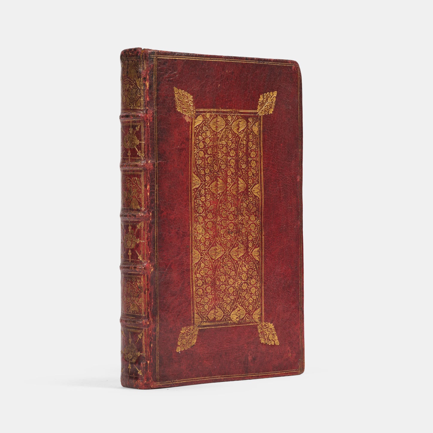 A beautiful example of Richard Allestree's The Whole Duty of Man, well-preserved in this English Restoration red goatskin binding