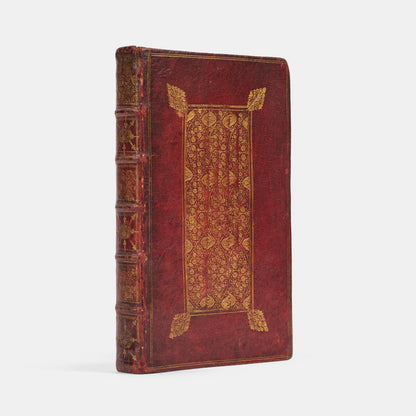 A beautiful example of Richard Allestree's The Whole Duty of Man, well-preserved in this English Restoration red goatskin binding
