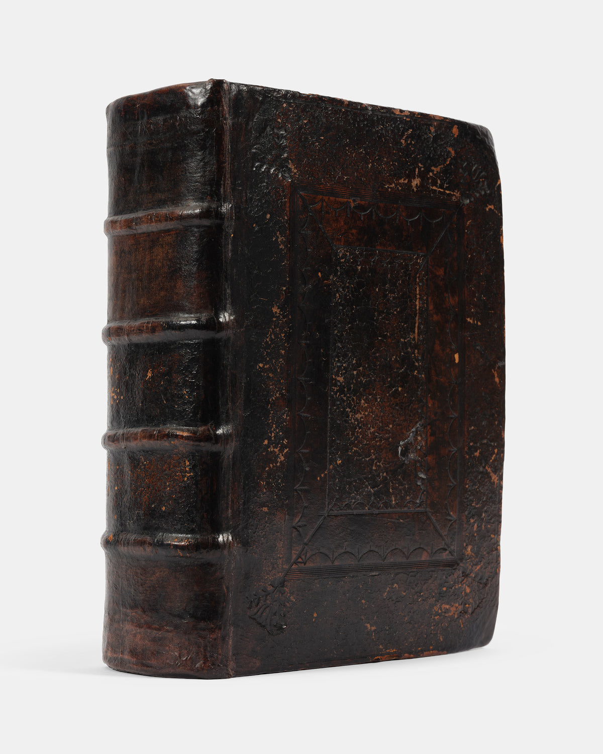 A superb, rare complete example of the Geneva Bible, bound with the Book of Common Prayer, Concordances and Pslam, in the original blind-panelled calf binding