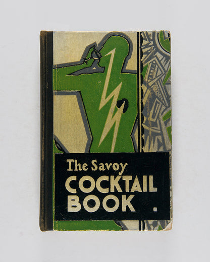 A handosme copy of The Savoy Cocktail Book by Harry Craddock. 