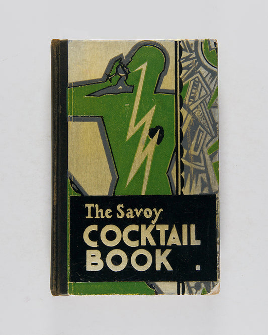 A handosme copy of The Savoy Cocktail Book by Harry Craddock. 