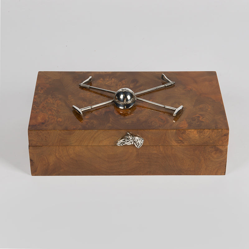 A very handsome Polo themed cigarette or cigar box with multiple uses for the non-smoker, with a pair of applied silver-plated polo mallets and helmet mounted on the lid 