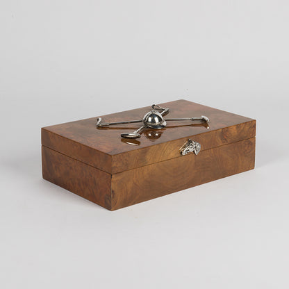 A very handsome Polo themed cigarette or cigar box with multiple uses for the non-smoker, with a pair of applied silver-plated polo mallets and helmet mounted on the lid 