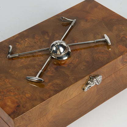 A very handsome Polo themed cigarette or cigar box with multiple uses for the non-smoker, with a pair of applied silver-plated polo mallets and helmet mounted on the lid 