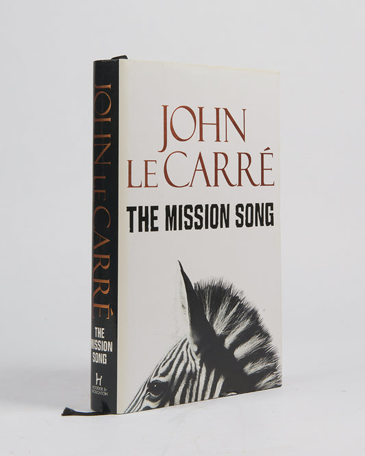 A signed first edition of The Mission Song by John le Carré.
