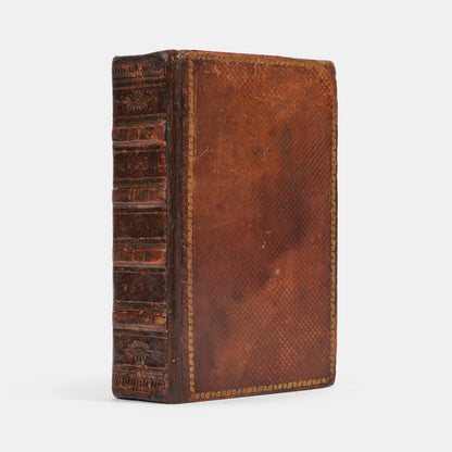 A pleasing octavo edition of the King James Bible, ruled in red throughout and bound with The Book of Common Prayer and The Whole Book of the Psalmes