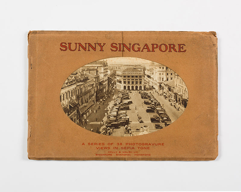 Sunny Singapore, published by Kelly and Walsh, containing views of Singapore including the Raffles Hotel, Government House, and other important buildings of the city.