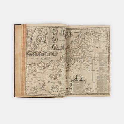 The first distinct folio edition of the King James Bible, complete in the contemporary blind-panelled calf binding with Speed's Genealogies, including his double-page map of Canaan