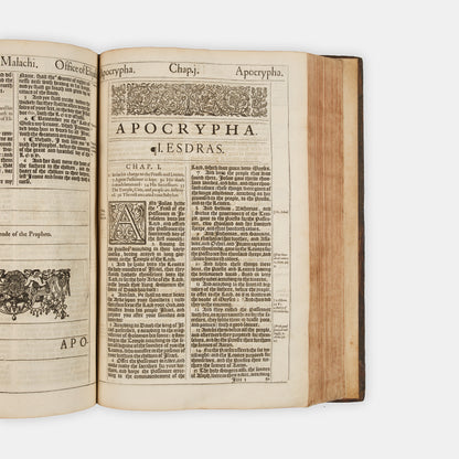 The first distinct folio edition of the King James Bible, complete in the contemporary blind-panelled calf binding with Speed's Genealogies, including his double-page map of Canaan