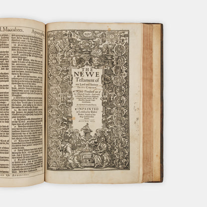 The first distinct folio edition of the King James Bible, complete in the contemporary blind-panelled calf binding with Speed's Genealogies, including his double-page map of Canaan
