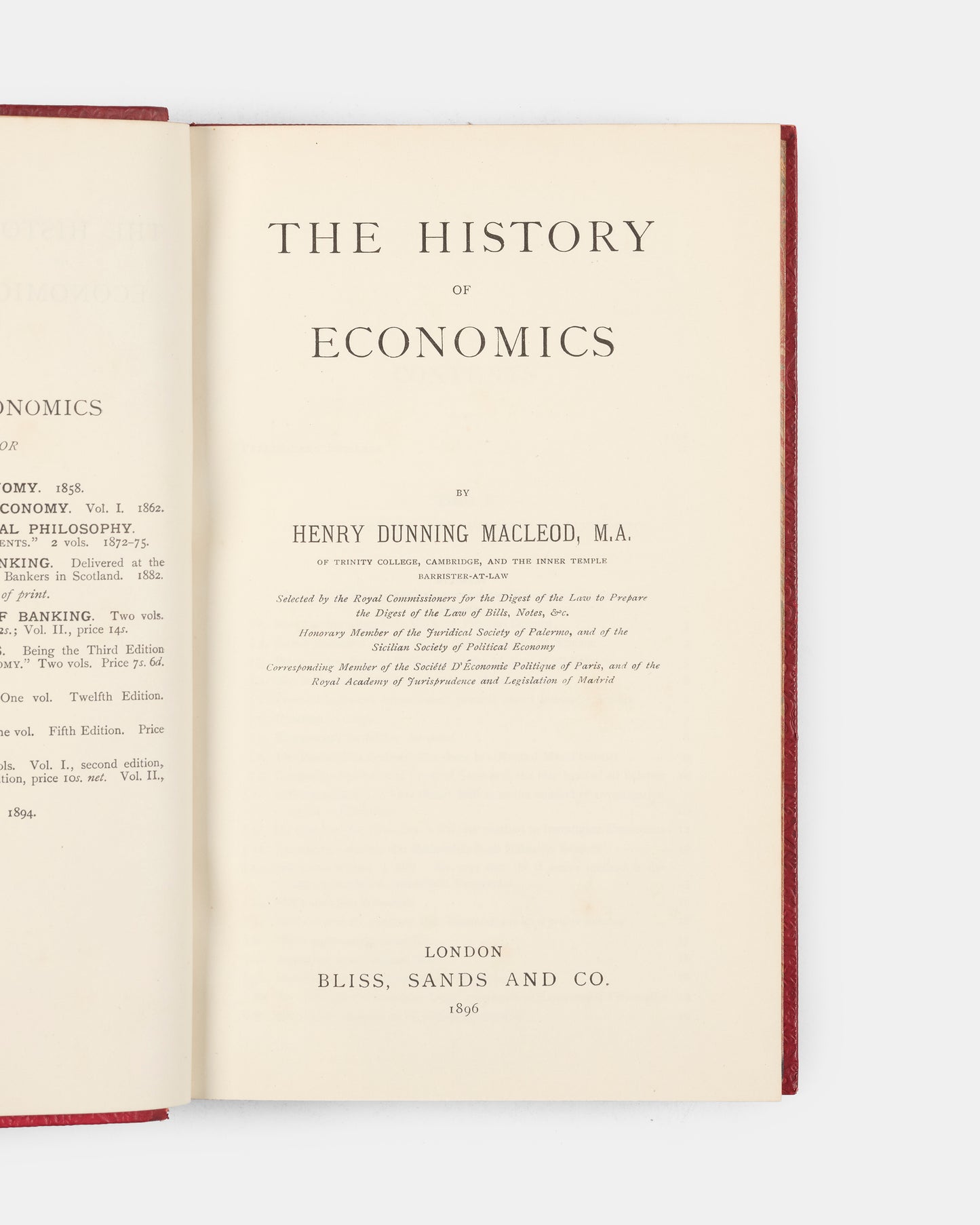 A scarce first edition of Henry Dunning Macleod's History of Economics bound in full red calf for the Bradford Modern School. 