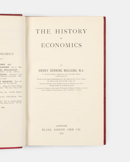 A scarce first edition of Henry Dunning Macleod's History of Economics bound in full red calf for the Bradford Modern School. 
