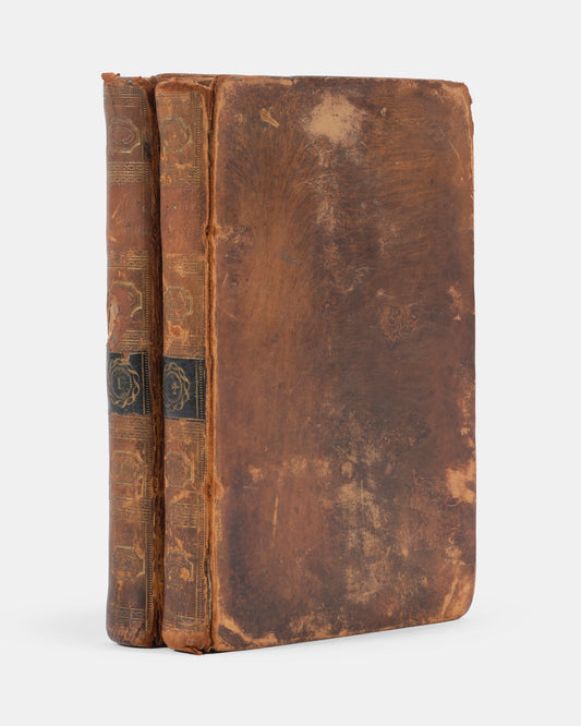 A pocket-sized 'Cooke Edition' of The Expedition of Humphry Clinker by Tobias Smollett, embellished with six black and white plates across two volumes. 
