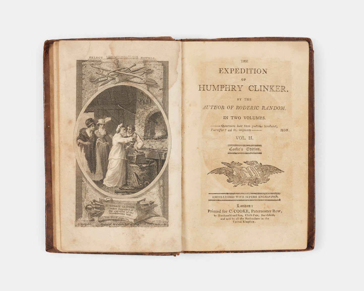 A pocket-sized 'Cooke Edition' of The Expedition of Humphry Clinker by Tobias Smollett, embellished with six black and white plates across two volumes. 