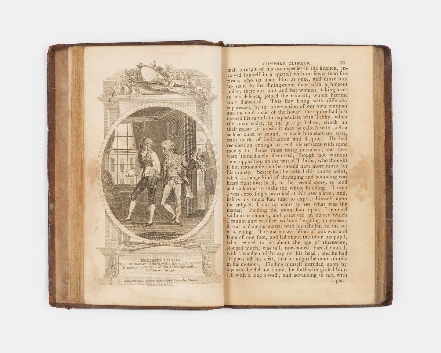 A pocket-sized 'Cooke Edition' of The Expedition of Humphry Clinker by Tobias Smollett, embellished with six black and white plates across two volumes. 