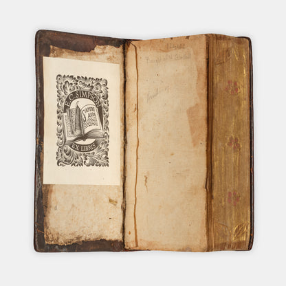 A charming, mid-seventeenth century 'fan' binding of dark brown calfskin tooled in gilt, enclosing a scarce pocket edition of the Kind James Bible
