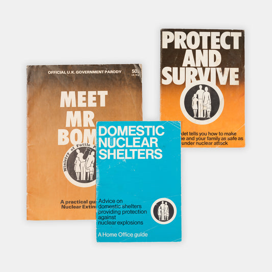 Uncommon first editions of the UK's famous <em>Protect and Survive</em> civil defense pamphlet, its companion volume, <em>Domestic Nuclear Shelters</em>, and the parody <em>Meet Mr. Bomb.</em>