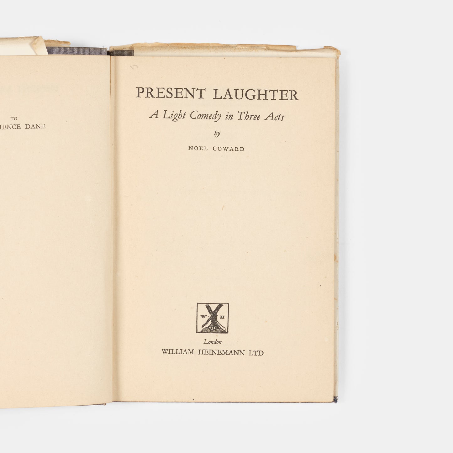 A signed first edition of Present Laughter by Noel Coward.