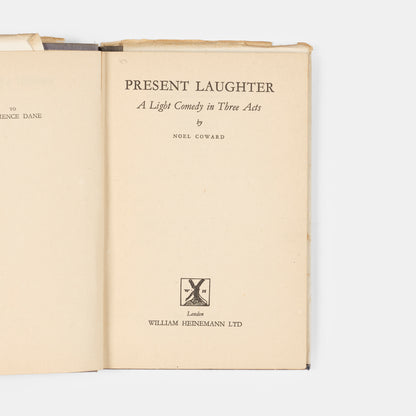 A signed first edition of Present Laughter by Noel Coward.