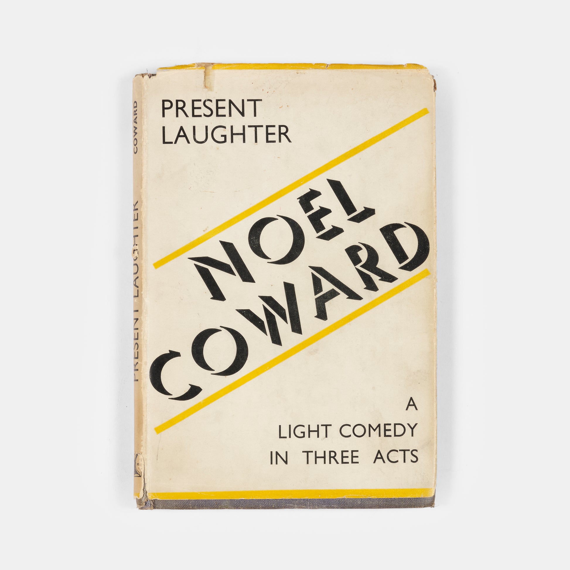 A signed first edition of Present Laughter by Noel Coward.